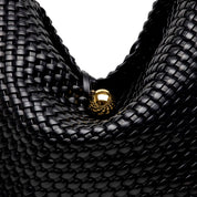 Maxi shopper a spalla con effetto intrecciato.