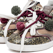 Sneakers in camoscio taupe e glitter bronzo.