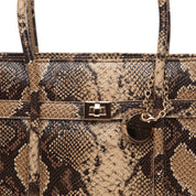 Shopper a mano in stampa rettile roccia.