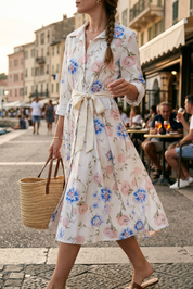 Abito camicia in cotone con cintura.