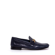 Mocassino uomo in pelle bottolata con morsetto.
