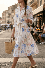 Abito camicia in cotone con cintura.