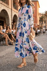 Abito in cotone in fantasia floreale.