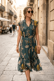 Abito midi in fantasia con base verde. - TreemmeCreazioni