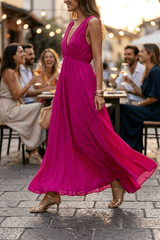 Abito stile impero color fuxia.