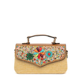 Borsa a mano clutch in rafia con applicazioni