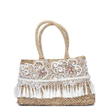 Borsa a mano in rafia naturale con pizzo floreale bianco