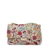 Borsa bauletto in tessuto floreale.