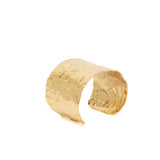 Bracciale rigido effetto oro.