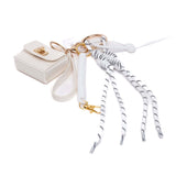 Charms per borse e cinture.