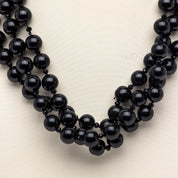 Collana con filo unico di perle nere. - TreemmeCreazioni