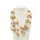 Collana multifili asimmetrica con sfere,