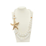 Collana multifili con pietre e stella marina.