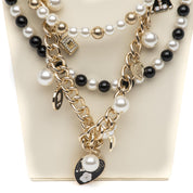 Collana multistrati con catena dorata e perle. - TreemmeCreazioni