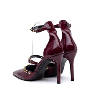 Décolleté in naplak rosso rubino con borchie. - TreemmeCreazioni
