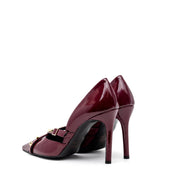 Décolleté in naplak rosso rubino con borchie. - TreemmeCreazioni