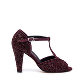 Décolleté open toe con cinturino tanguera.