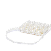 Mini pochette in perle avorio. - TreemmeCreazioni