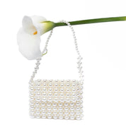 Mini pochette in perle avorio. - TreemmeCreazioni
