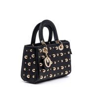 Mini shopper a mano con borchie dorate applicate. - TreemmeCreazioni