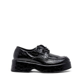 Scarpa stringata in cocco con platform.