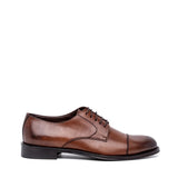 Scarpa uomo elegante in pelle color cuoio.