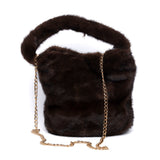 Shopper a mano in eco pelliccia.