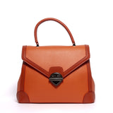 Shopper a mano in ecopelle arancio.
