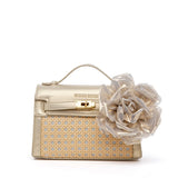Shopper a mano in rafia.