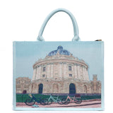 Shopper a mano in tessuto con stampa.