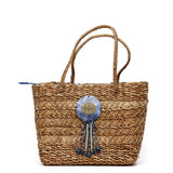 Shopper in rafia con perline.