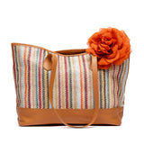Shopper in rafia e pelle.