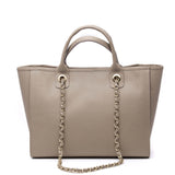 Shopping bag in pelle bottolata color fango.