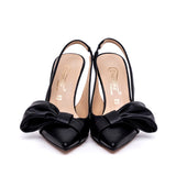 Slingback nero con fiocco stilizzato.