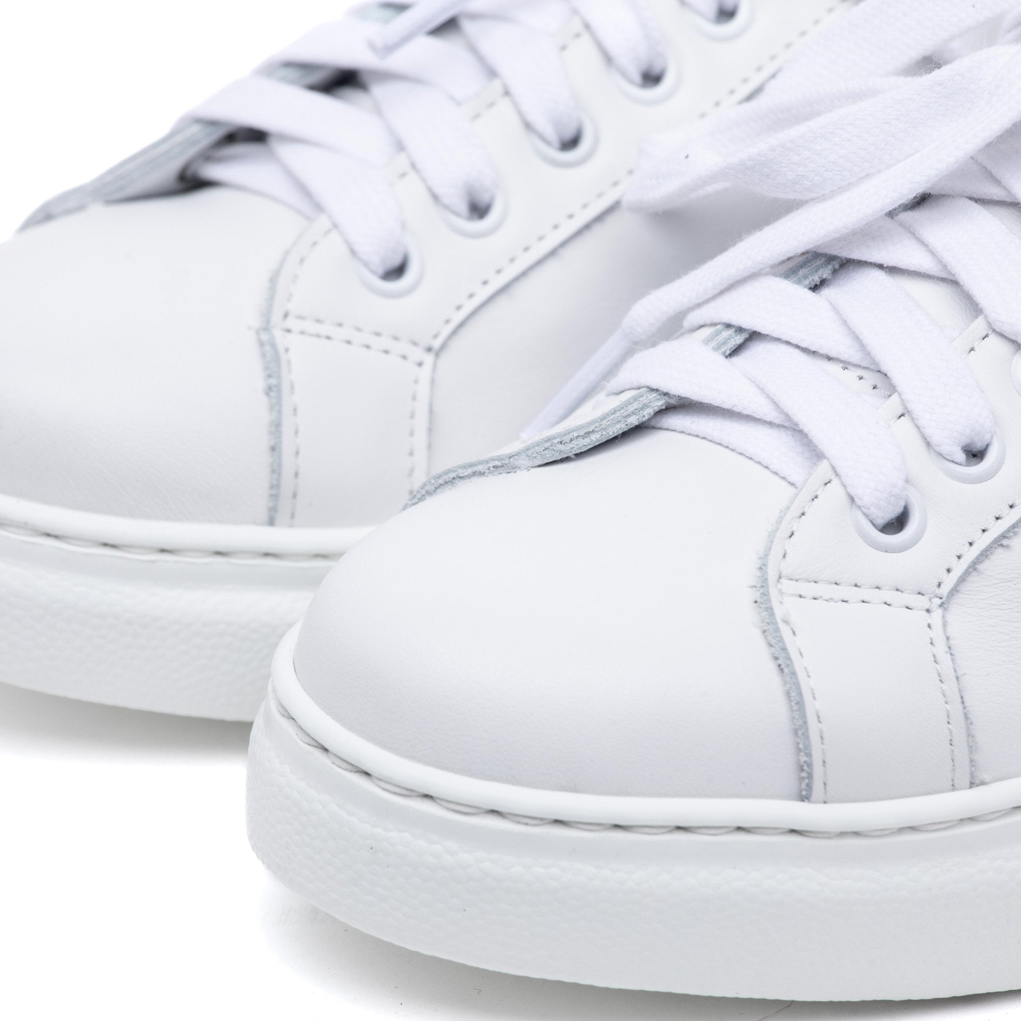 Sneakers in vitello bianco fondo volume. - TreemmeCreazioni