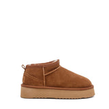 Stivaletto in camoscio con eco pelliccia.