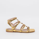 Flat sandal with studs.