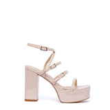 Patent sandal with platform.