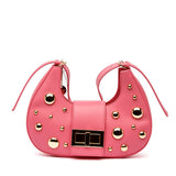 Shopper rigida con maxi borchie oro.